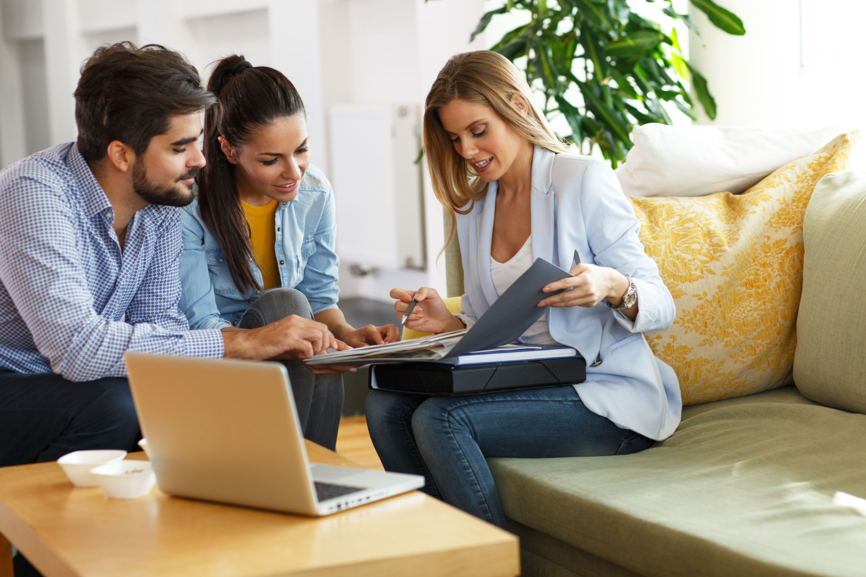 A real estate broker closing a deal with a new client.